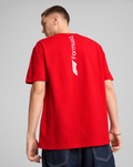 Back view of red F1 Essential Relaxed Tee with white vertical Formula 1 branding down the back.