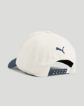 Back view of white cap with blue Puma logo and perforated adjustable strap.