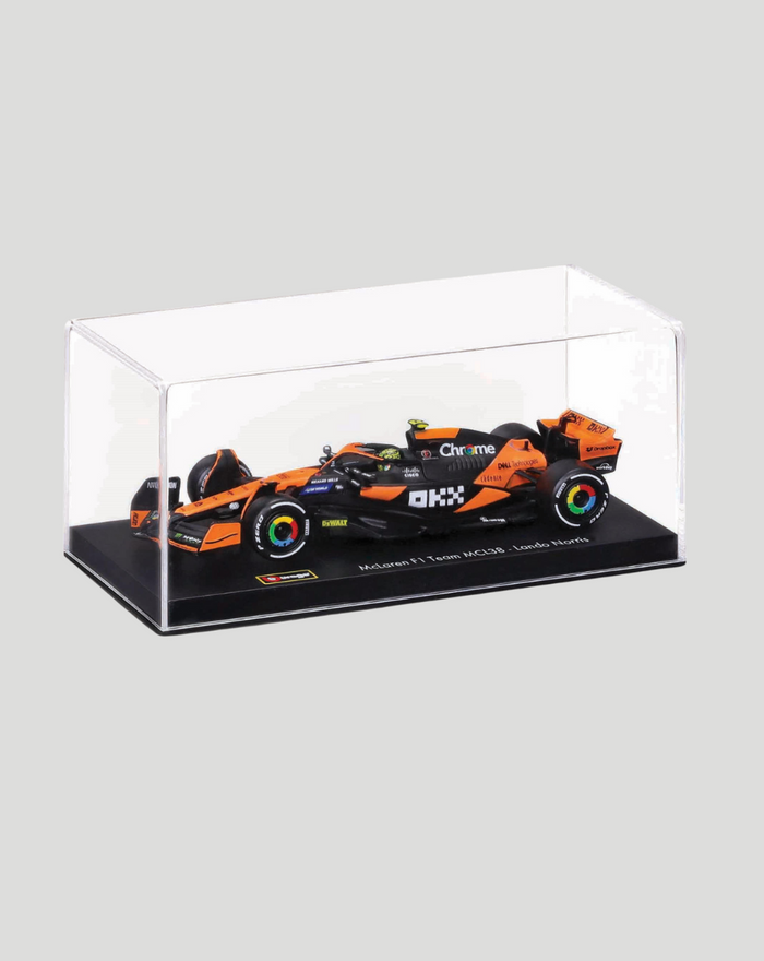 1:43 scale McLaren MCL38 2024 model displayed in a clear display case on a black base
