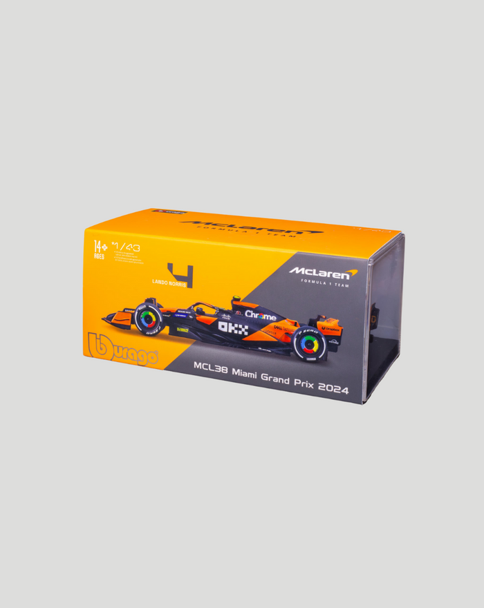 Angled view of the McLaren MCL38 2024 model box with bright orange top and car illustration