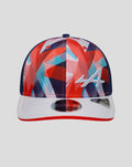 Front view of the Alpine cap featuring a multicolor geometric crown, white embroidered A logo, navy side panels, and a white brim with red edge.