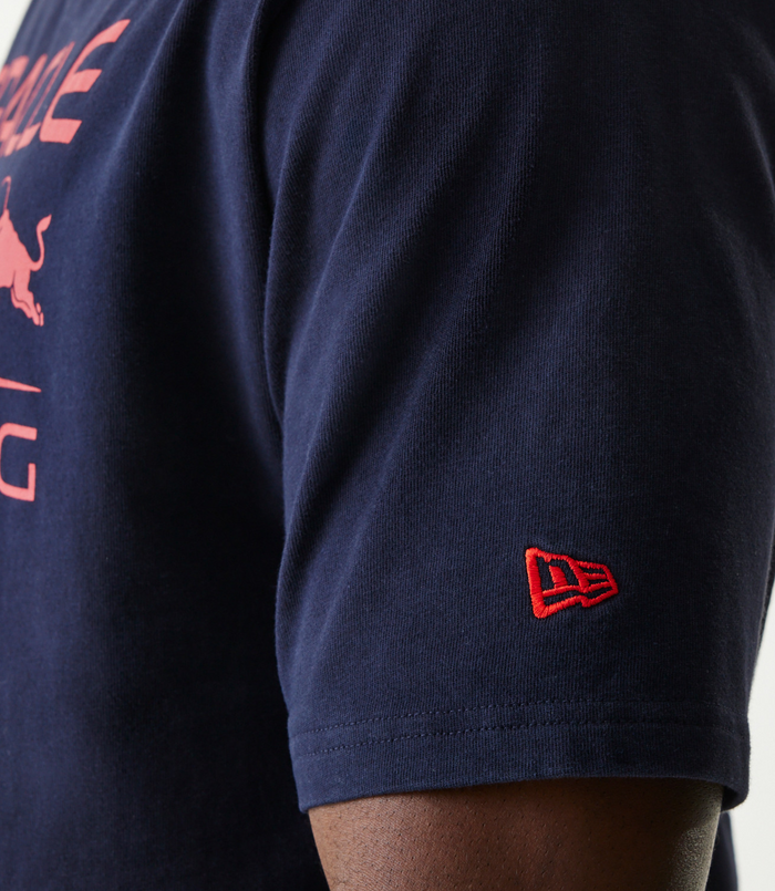 Close up of navy blue oversized T shirt with large Oracle Red Bull Racing print and Red Bull logo