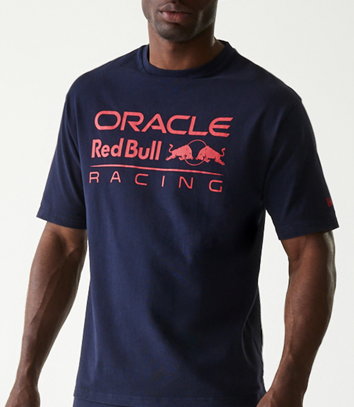 Close up of a navy oversized T-shirt featuring the Oracle Red Bull Racing graphic across the chest.