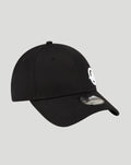 Three-quarter view of a black New Era Haas Team cap displaying the white Haas logo on the front and the New Era emblem on the side