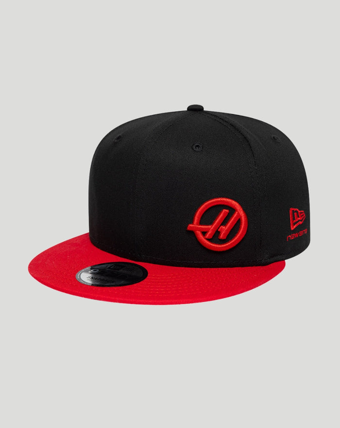 Black Haas Team 9Fifty snapback with red brim and raised Haas emblem on front