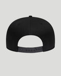 Rear angle of the black Haas cap showing the adjustable strap and red side logo