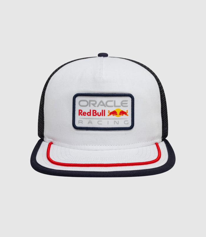 Top front view of the white cap showing a navy button and black mesh back