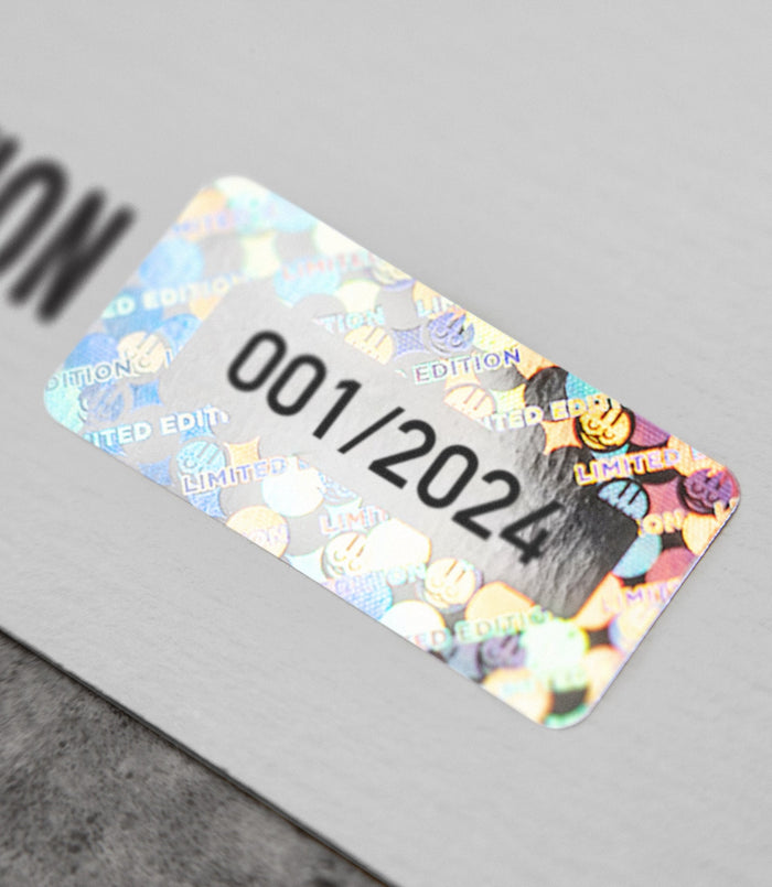 Close-up of the limited edition McLaren poster showing its serial number