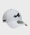 Side view of white cap with black BWT embroidery on rear and 9Forty adjustable sticker on the brim