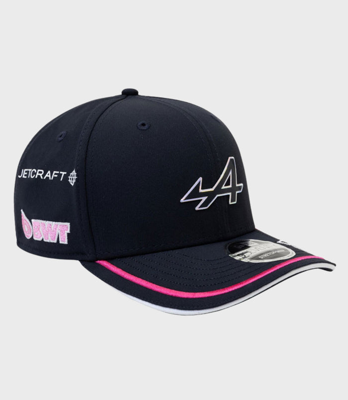 Navy cap with pink edged brim showing large stitched front logo and Jetcraft branding on the side
