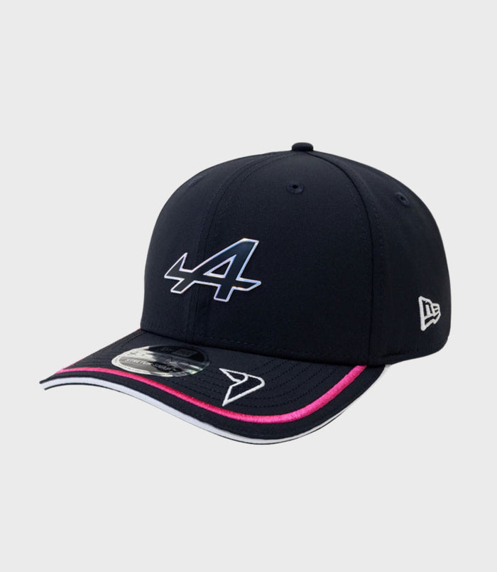Navy New Era Alpine Rep Driver 9Seventy cap with pink trimmed brim and partial front logo