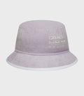 Pastel purple bucket hat close up showing Oracle Red Bull Racing branding on the crown