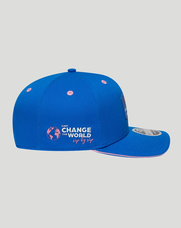 Rear view of blue BWT Alpine cap showing the snap closure and crown stitching.