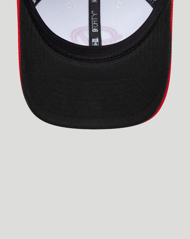 Front view of black on black New Era Haas Team 9Forty cap with a red edge on the brim.