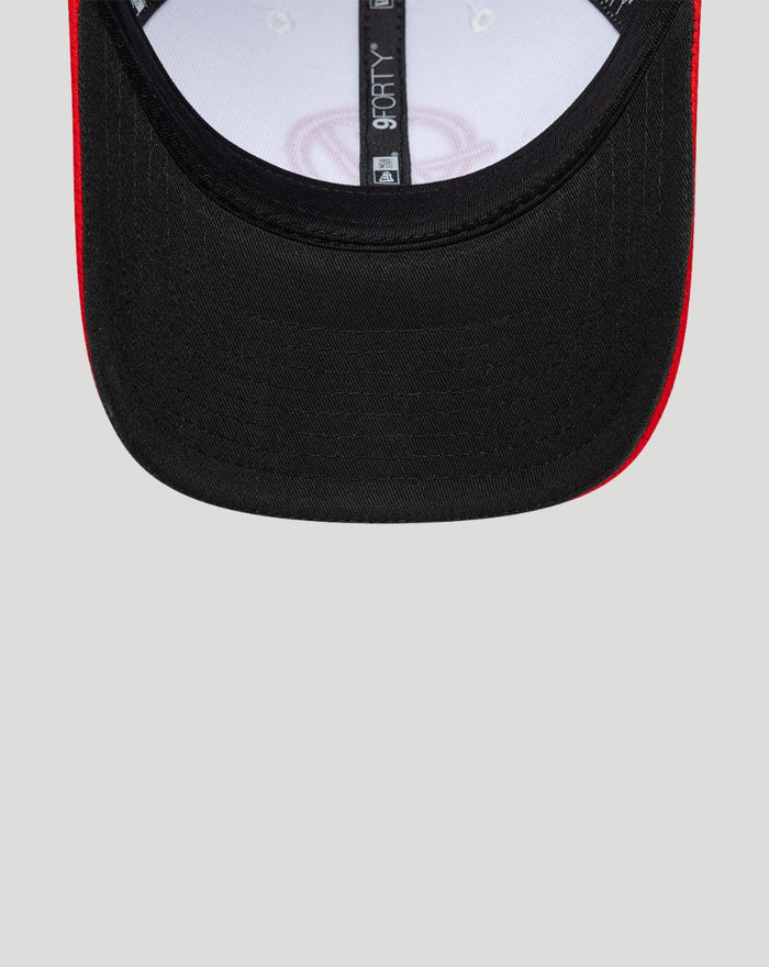 Front view of black on black New Era Haas Team 9Forty cap with a red edge on the brim.