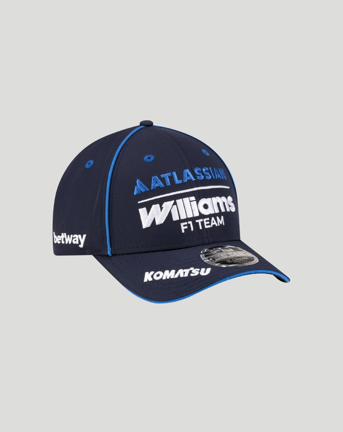 Navy New Era 9Forty Williams Racing cap with Atlassian Williams F1 Team logo on front, Bw Scores sidepatch on right, Komatsu logo on visor, blue piping and curved visor