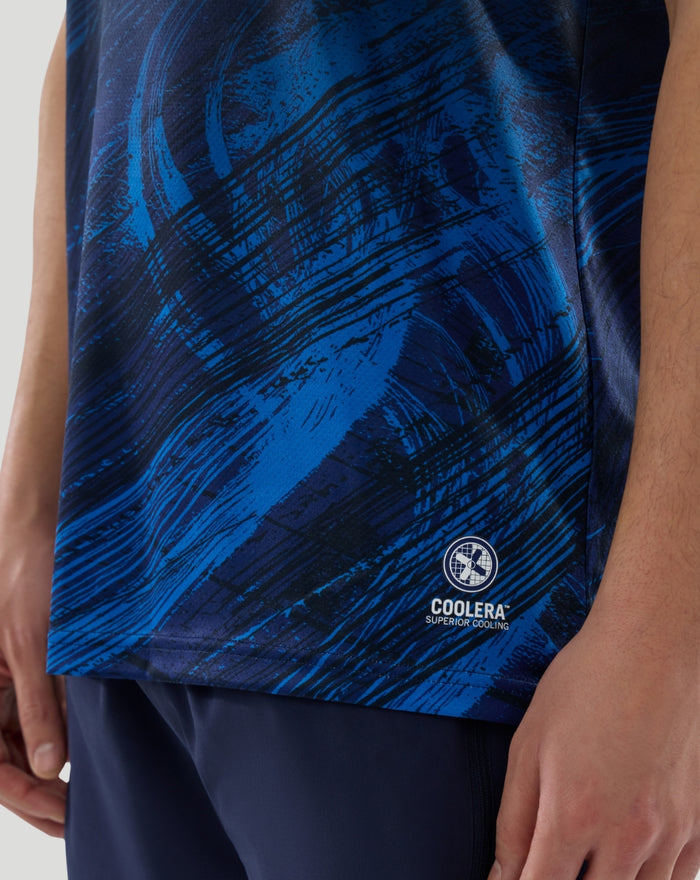 Close-up of navy Williams Racing T-Shirt showing blue brushstroke pattern and COOLERA cooling badge near the hem