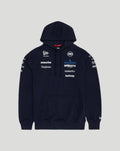 Man wearing navy Williams Racing hoodie with matching cap displaying team logos and sponsor names on chest and sleeves