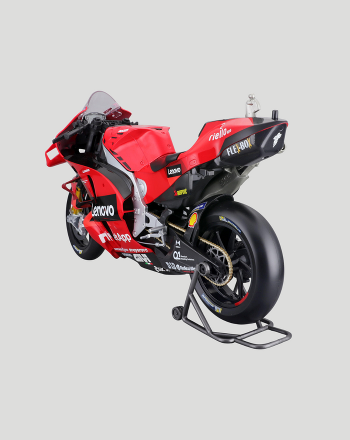 Side view of red Ducati Lenovo racing bike model with sponsor decals