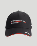 Front view of a black Porsche Motorsport cap with curved brim featuring the Porsche Motorsport logo and a red trim along the edge and a white Puma cat emblem on the brim