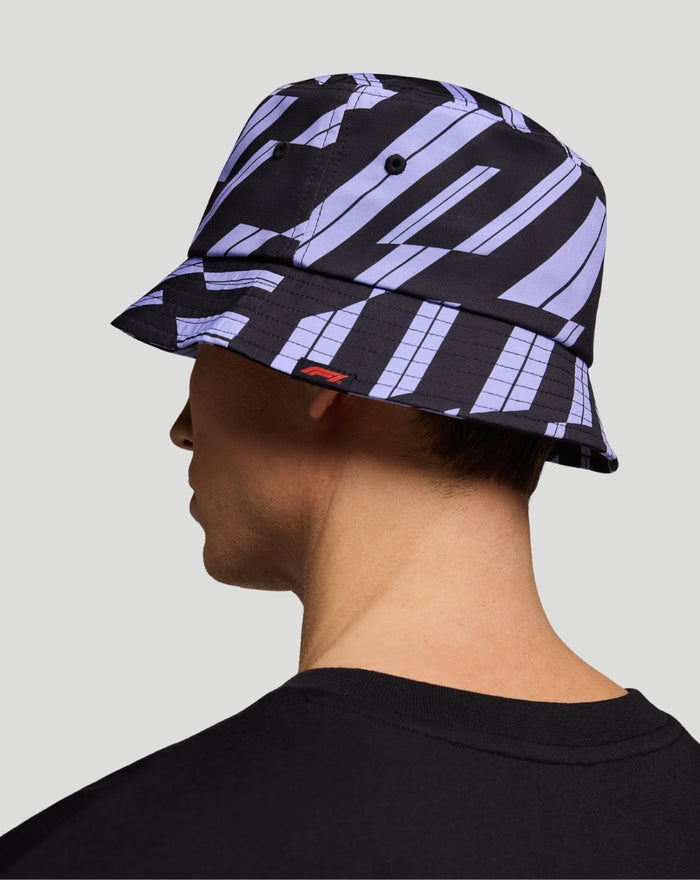 Side view of the purple and black track graphic bucket hat with white F1 emblem.