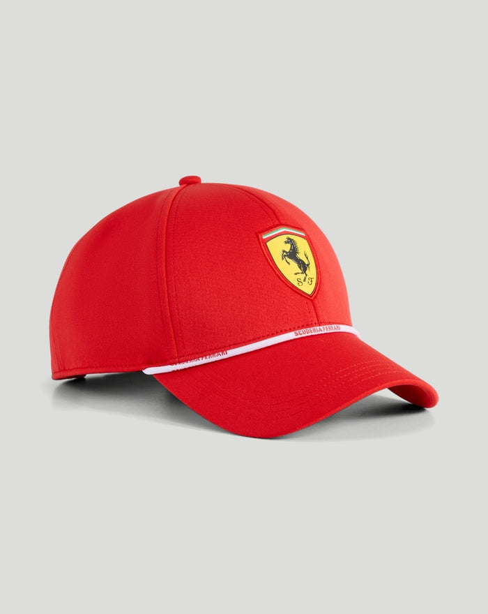 Red Scuderia Ferrari cap with yellow shield and prancing horse logo on front