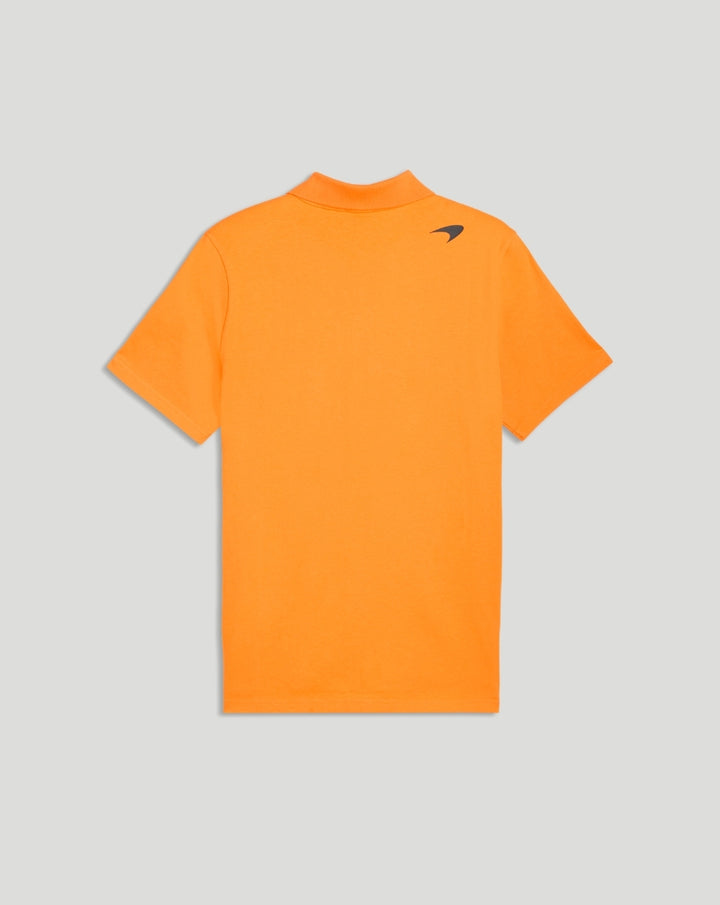 Back view of the orange Papaya McLaren polo showing the small logo on the upper back near the shoulder