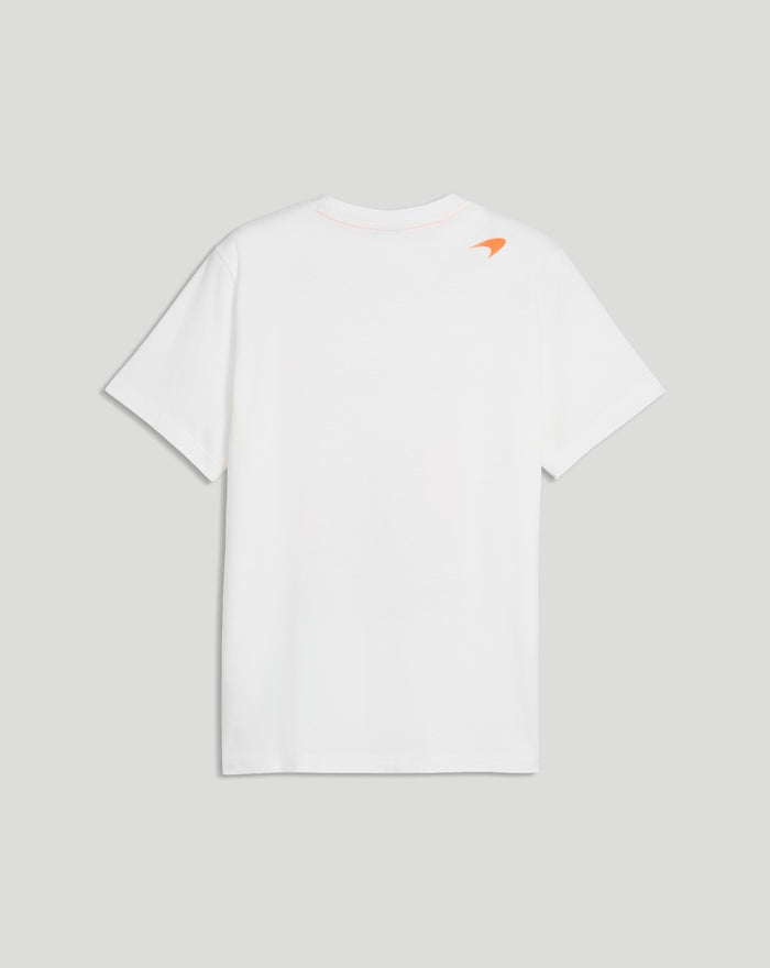 Back view of white McLaren T shirt with a small orange logo on the upper back near the shoulder