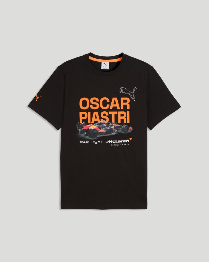 Flat lay of black McLaren Piastri Core T-Shirt featuring orange OSCAR PIASTRI text and race car graphic