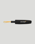 Black McLaren Racing umbrella with orange wrist strap and branding on the canopy