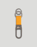 McLaren Fanwear key ring with a yellow textured strap and gray metal clip