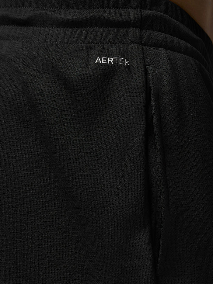 Close-up of the waistband on black Adapt Training shorts showing AERTEK branding.