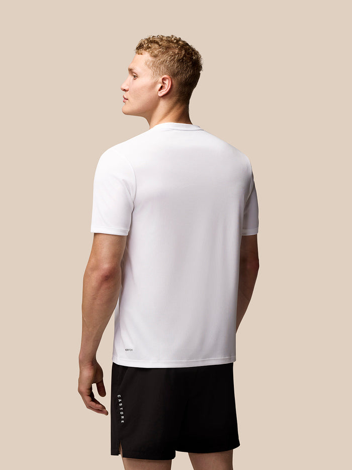 Back view of white Adapt Training T-Shirt with plain back and small branding at the lower back