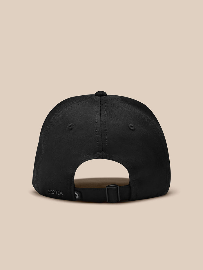 Back view of black nylon cap with adjustable strap and Protek branding