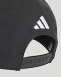 Close-up of the back of the black cap with white Adidas logo and the adjustable snapback strap.