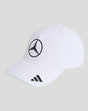 White cap with a black Mercedes emblem on the front and an Adidas logo on the brim