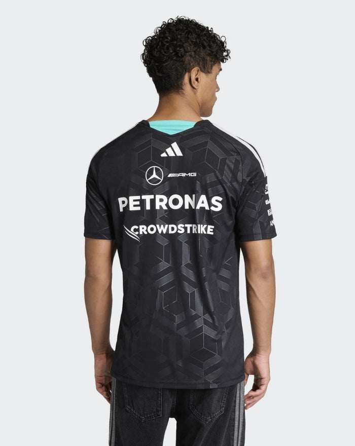 Back view of black Mercedes AMG Petronas F1 Team Driver T-Shirt featuring PETRONAS logo and sponsors.