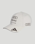 Front view of white Audi Team cap with rings logo and Revolut Team text on the front panel and dark brim accents.