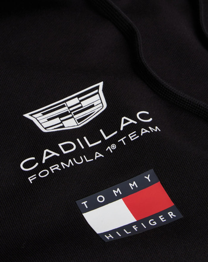 Black hoodie displaying Cadillac Formula 1 Team crest and Tommy Hilfiger patch