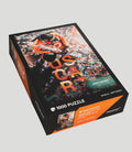 Oscar Piastri McLaren 1000 piece puzzle box showing a celebratory racing moment with confetti.