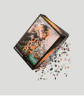 Angled view of a McLaren Oscar Piastri 1000 piece puzzle box with a celebratory race photo and confetti.