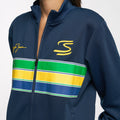 Close up of the Ayrton Senna unisex retro stripe jacket in navy showing the yellow S logo and signature on the chest with a multicolor stripe panel