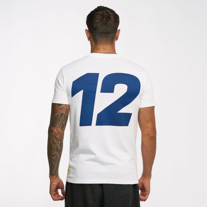 Back view of a model wearing a white Ayrton Senna T shirt with a bold blue number graphic across the back.