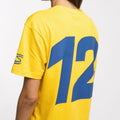 Back and side view of yellow Ayrton Senna Retro Stripe T Shirt with a bold stripe across the torso