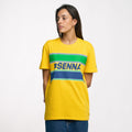 Side profile of a man wearing a yellow Ayrton Senna retro stripe T shirt with multicolor stripes