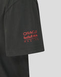 Close up of a black Oracle Red Bull Racing World Tour T‑shirt sleeve with a red logo.