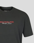 Detail of the chest area on a black World Tour T‑shirt with red logo and white World Tour script.