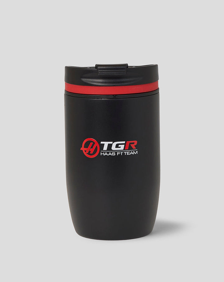 Official Haas Team Travel Coffee Cup in black with red trim and Haas branding on the side
