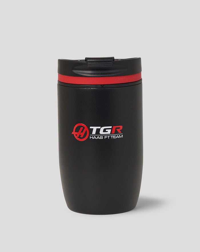 Official Haas Team Travel Coffee Cup in black with red trim and Haas branding on the side