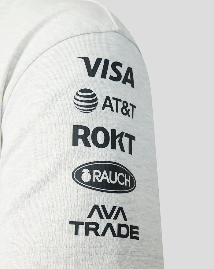 Sleeve of off white marl T shirt with vertical sponsor logos Visa AT&T ROKT Rauch and AVATRADE